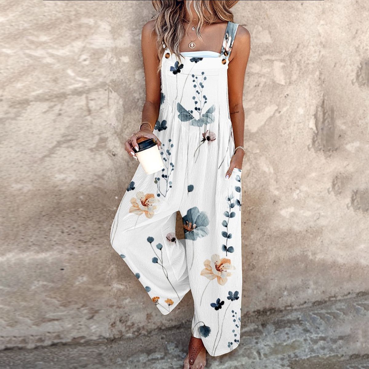 ELLIRA – SLEEVELESS JUMPSUIT WITH TAPERED LEGS & TIE WAIST